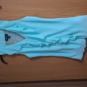 Mint green V-neck sleeveless blouse